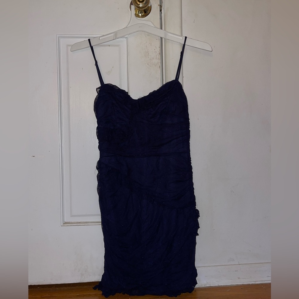 Navy polka dot ruffled Lucy in the sky dress
